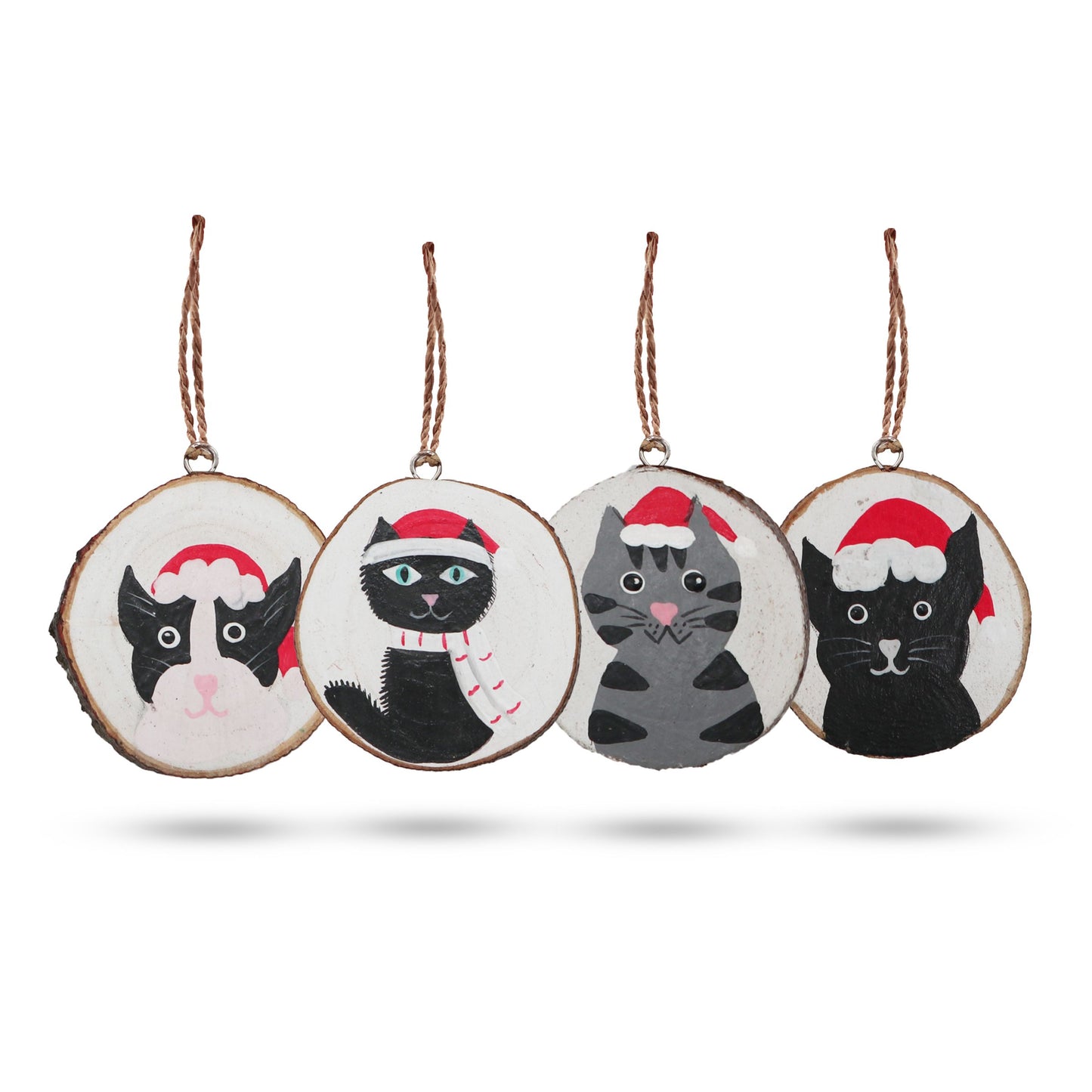Four Christmas-themed cat ornaments on a white background
