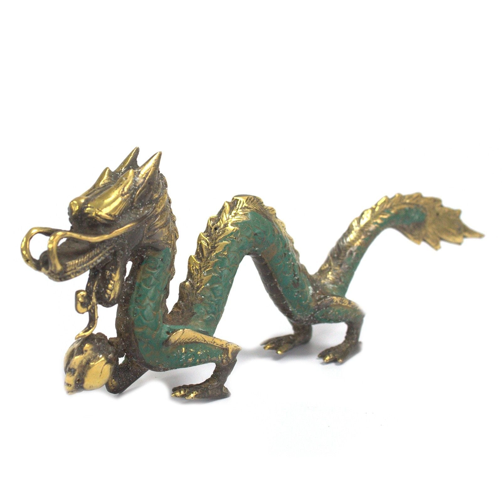 Bronze dragon figurine on a white background