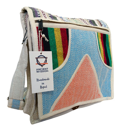 Colorful bag with geometric patterns and a 'Ancient Wisdom' tag on a white background