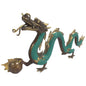 Decorative dragon figurine with green body and gold accents on a white background