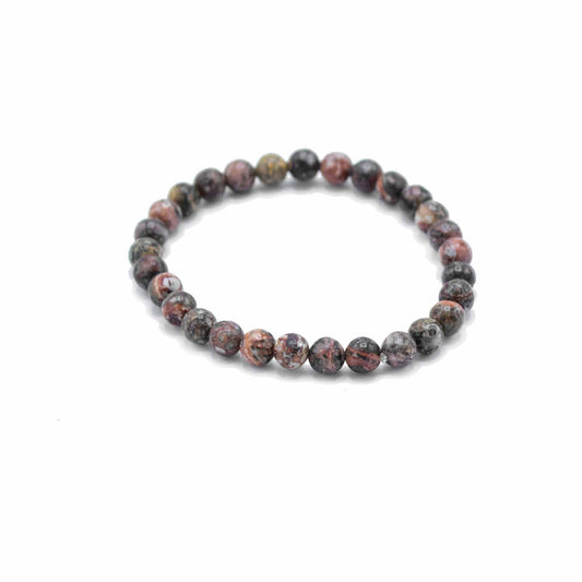 Beaded bracelet with multicolored stones on a white background