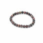 Beaded bracelet with multicolored stones on a white background
