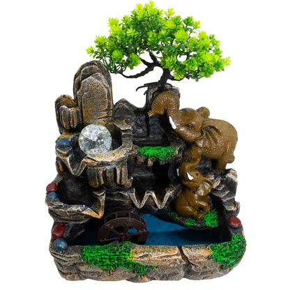 Decorative aquarium scene with rocks, trees, and animals on a white background