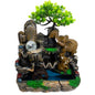 Decorative aquarium scene with rocks, trees, and animals on a white background