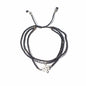 Multistrand beaded bracelet with metal clasp on a white background