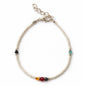 Pearl bracelet with colorful beads on a white background