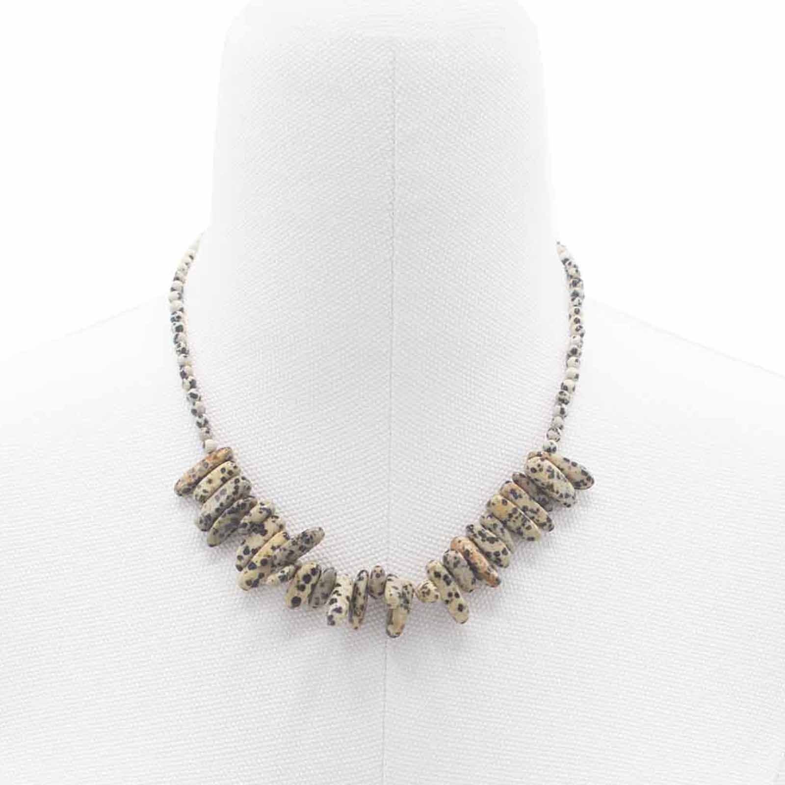 Necklace with stone-like beads on a white background