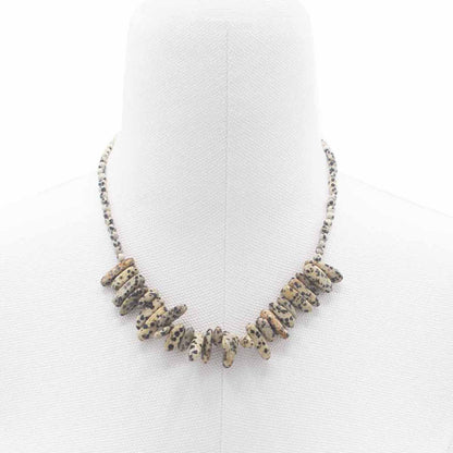 Necklace with stone-like beads on a white background