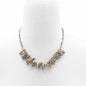 Necklace with stone-like beads on a white background